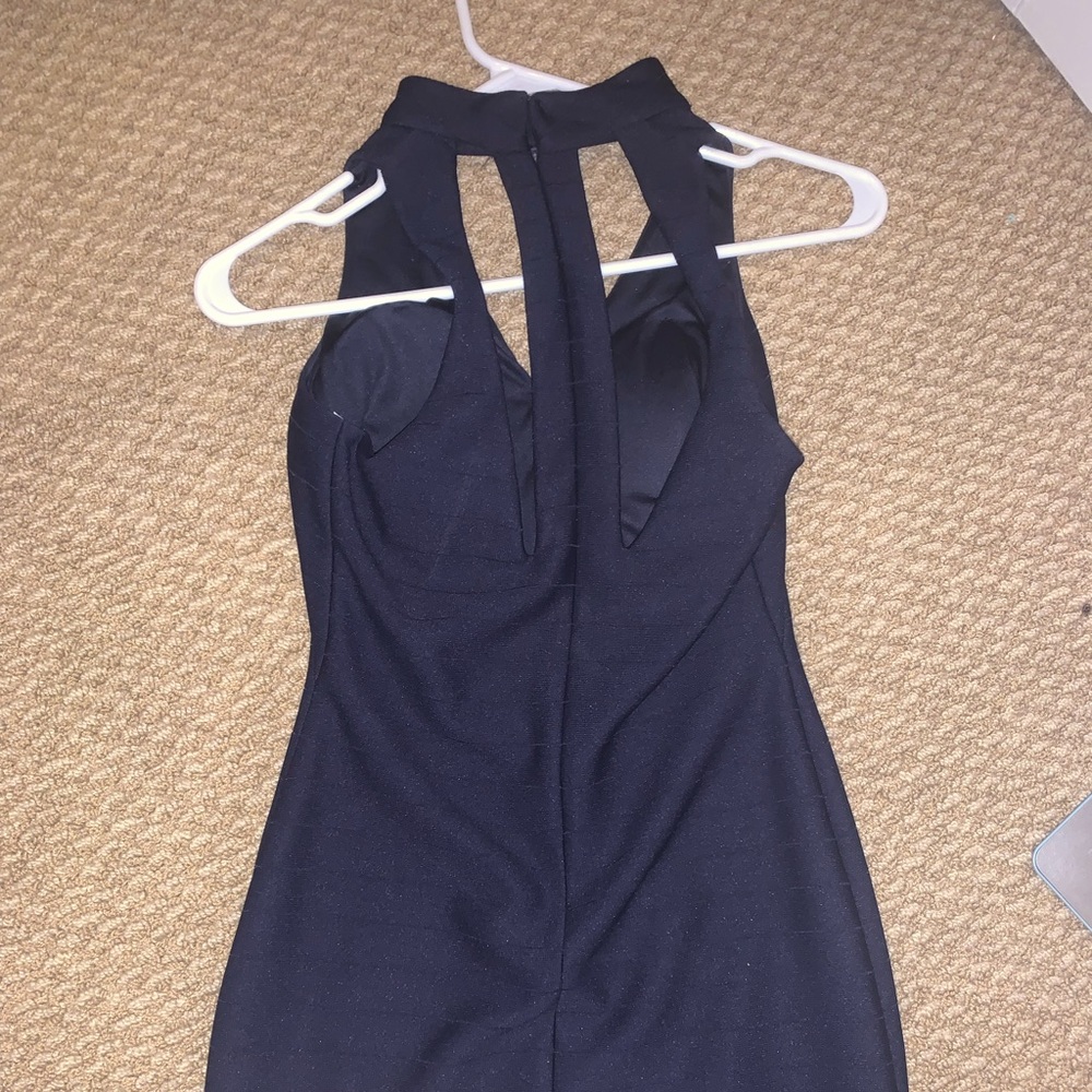 I am selling a cute and classy Navy Blue dress from the brand Dear Moon!